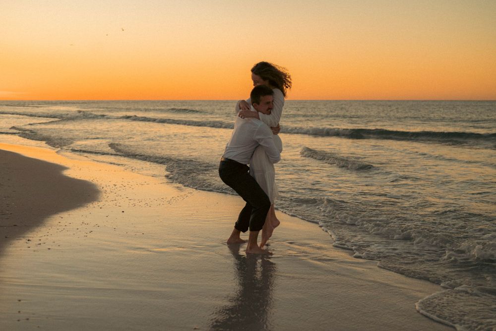 Cinematic destination engagement photoshoot showcasing couples and intimate moments across Destin, 30A, and the Emerald Coast
