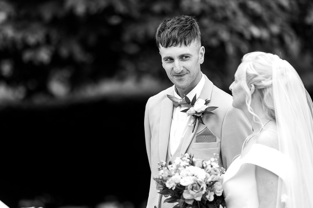 Groom seeing his bride for the first time, wedding photography Derbyshire, Shottle Hall