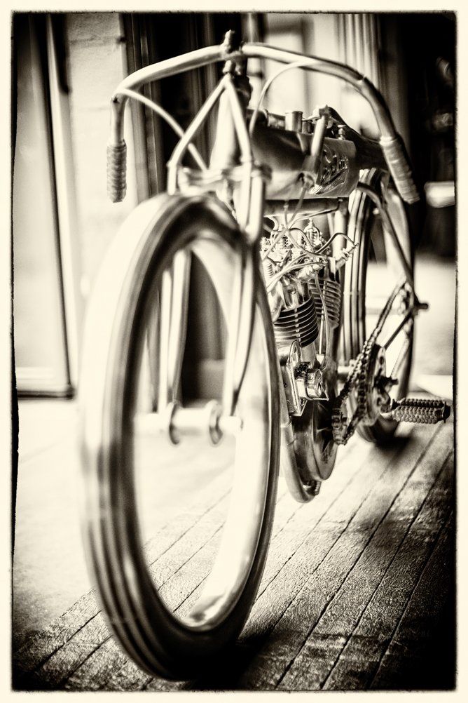Artistic black and white close-up of vintage bicycle handlebars and frame.