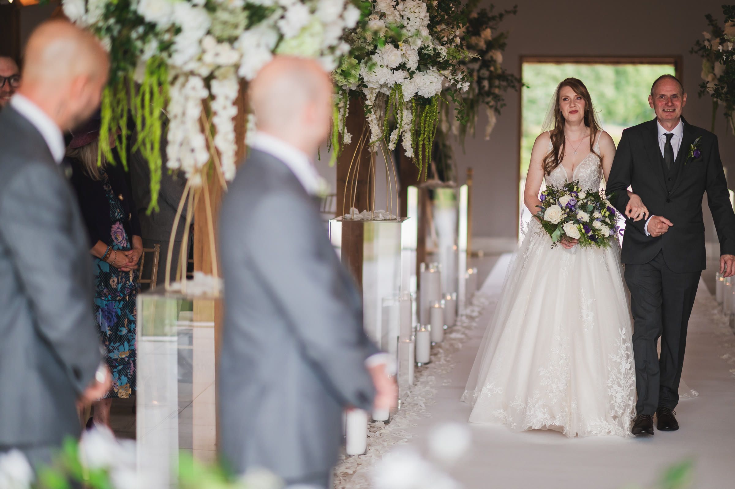 Charlotte walks down the aisle at Merrydale Manor, Cheshire