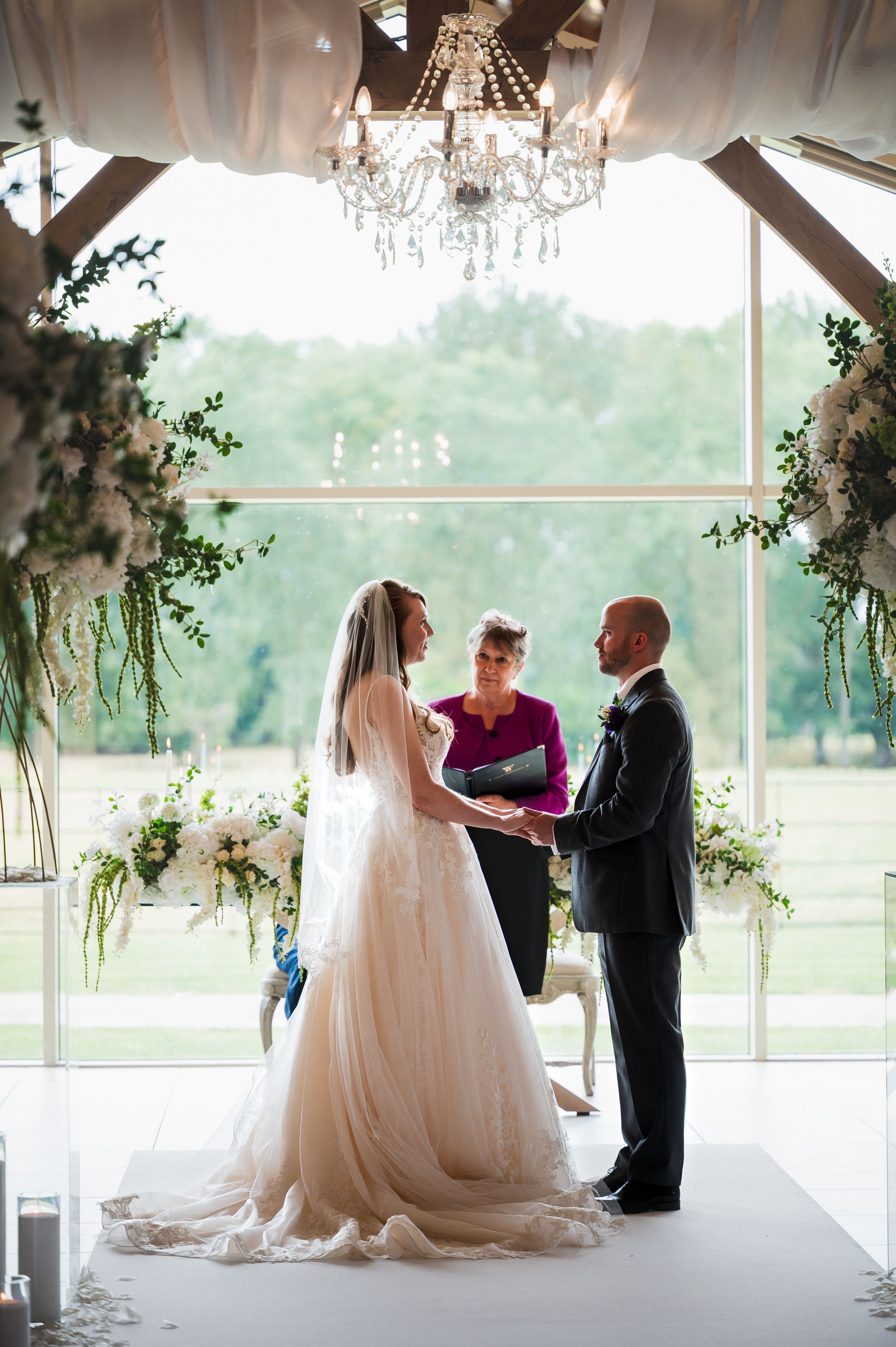 Charlotte and Niall making their vows in the ceremony room at Merrydale Manor
