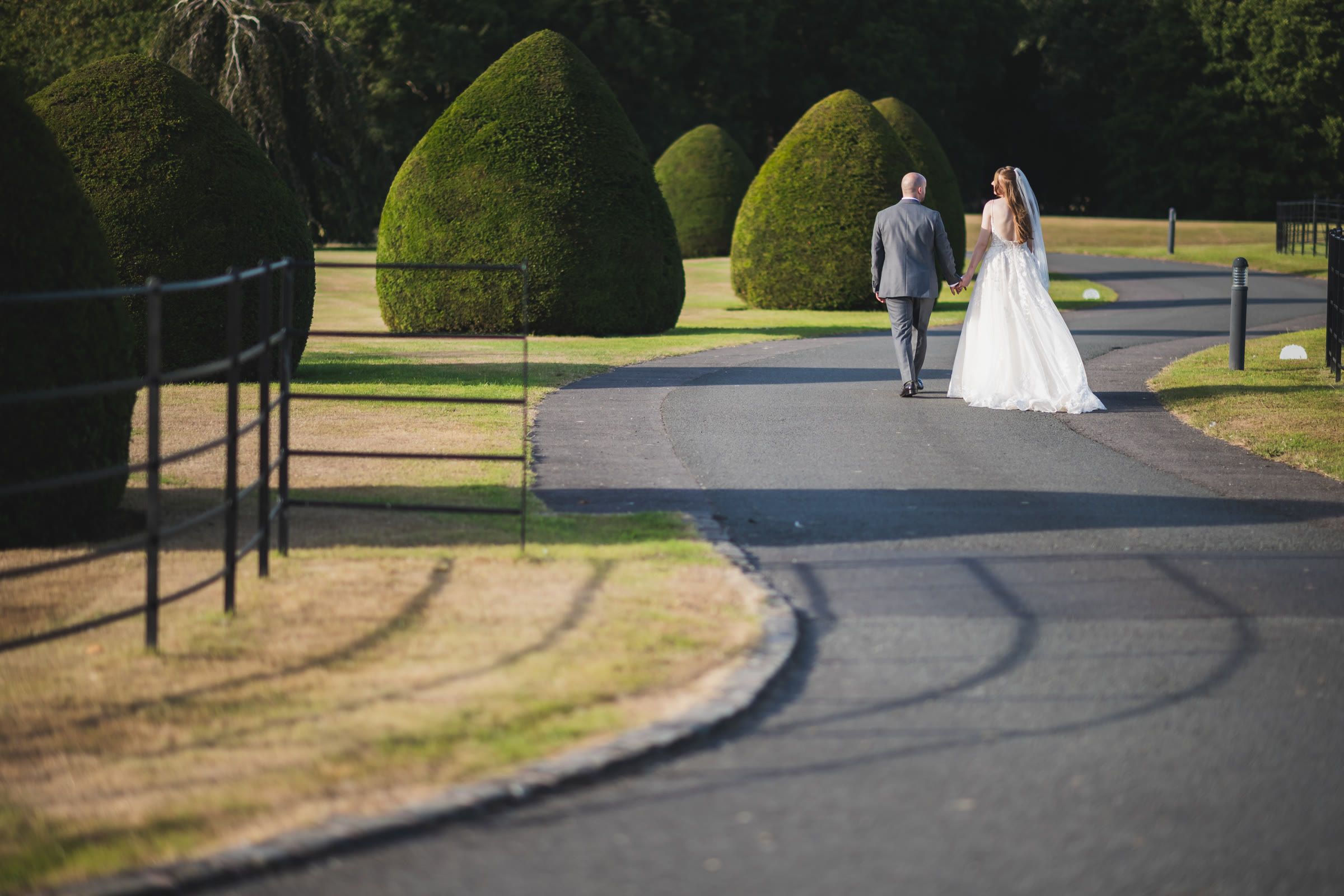 Charlotte and Niall on the driveway through the parkland at Merrydale Manor