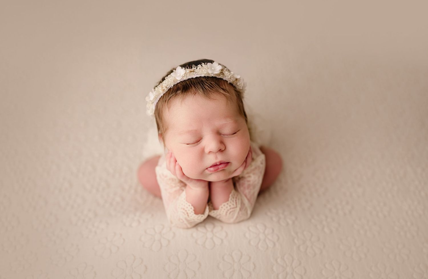Classic posed newborn photography session in Magnolia Texas with wrapped and unwrapped baby portraits on soft neutral backdrops by Anna Carr