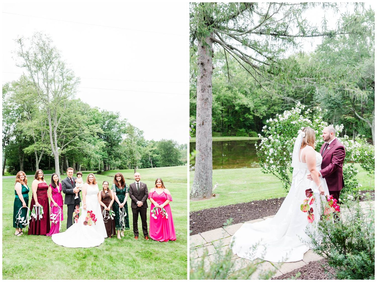 Wedding party poses on green lawn as bride and groom share a romantic moment by a white floral arch outdoors.