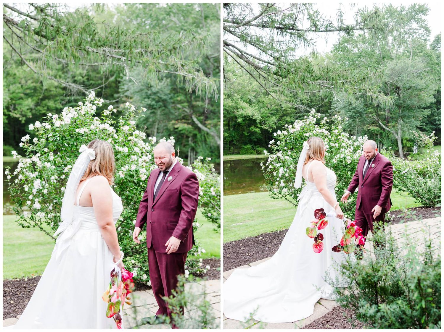 Bride and groom share an emotional first look moment near a blooming white floral arch in a lush garden setting.