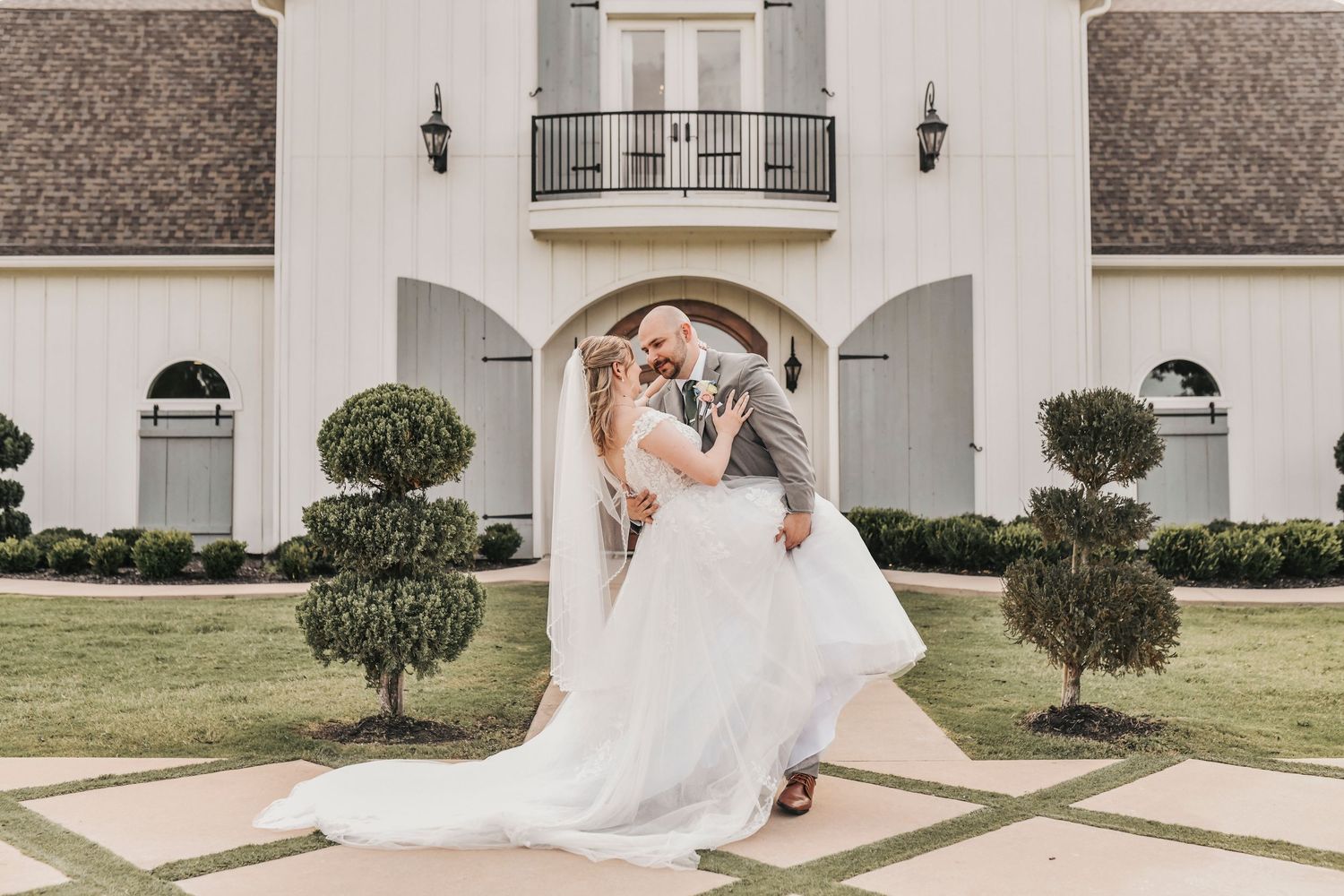 Romantic North Texas wedding party portraits outside The French Farmhouse