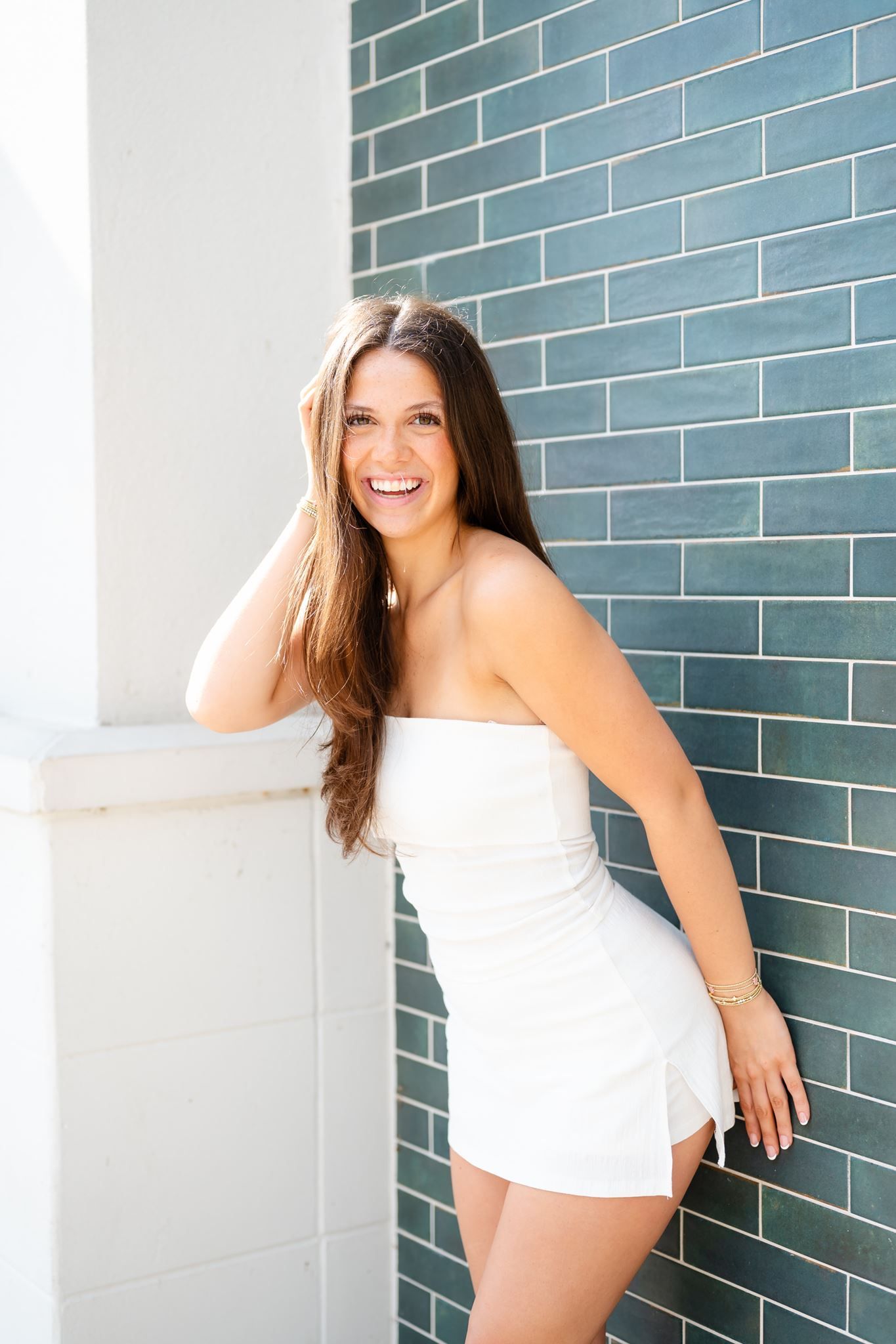 Senior girl posing at Hughes Landing in The Woodlands Texas
