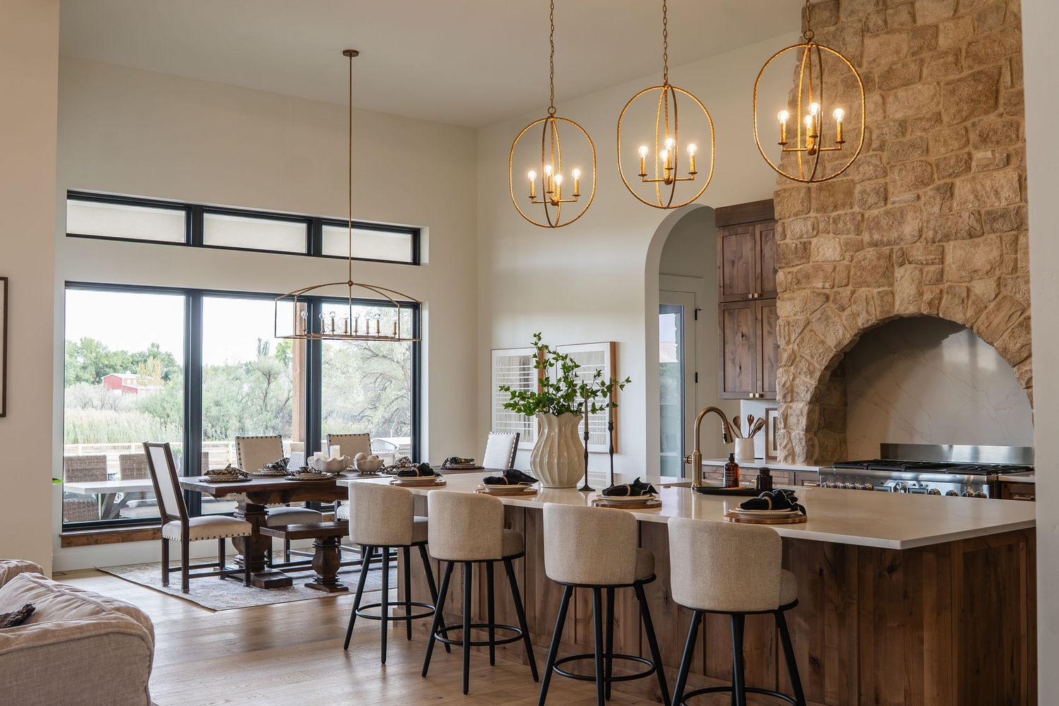 kitchen and dining area with large stone range
