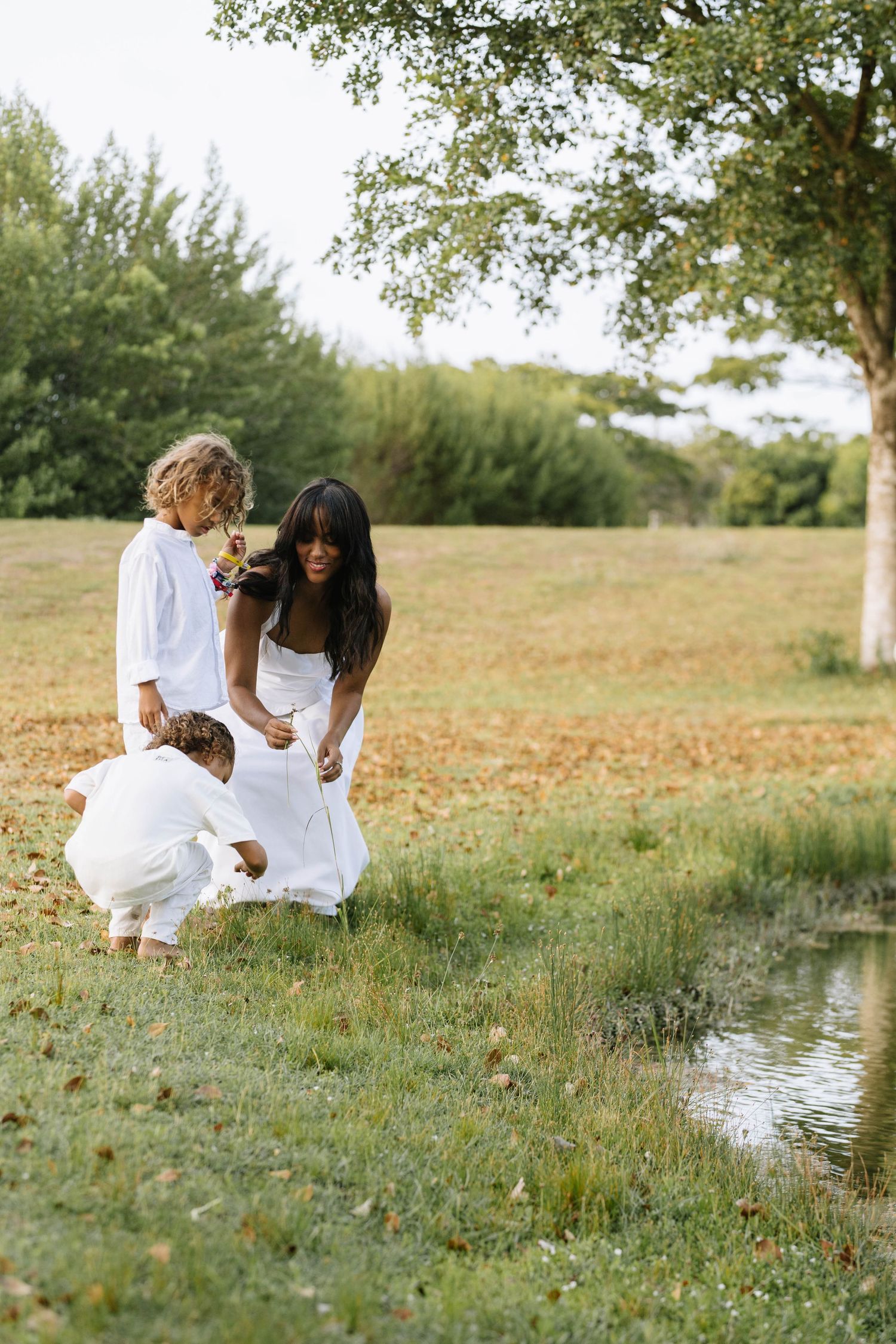 Outdoor family photos in Punta Cana with palm trees and ocean breeze. Bright, lively images full of Caribbean energy.