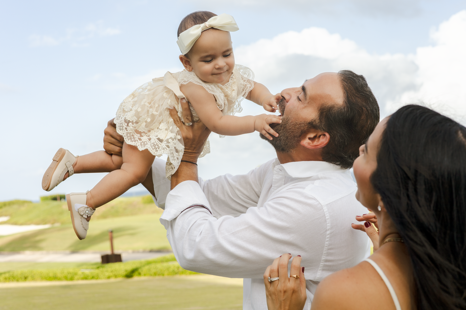 Elegant family beach portraits in Punta Cana with breathtaking ocean views.
