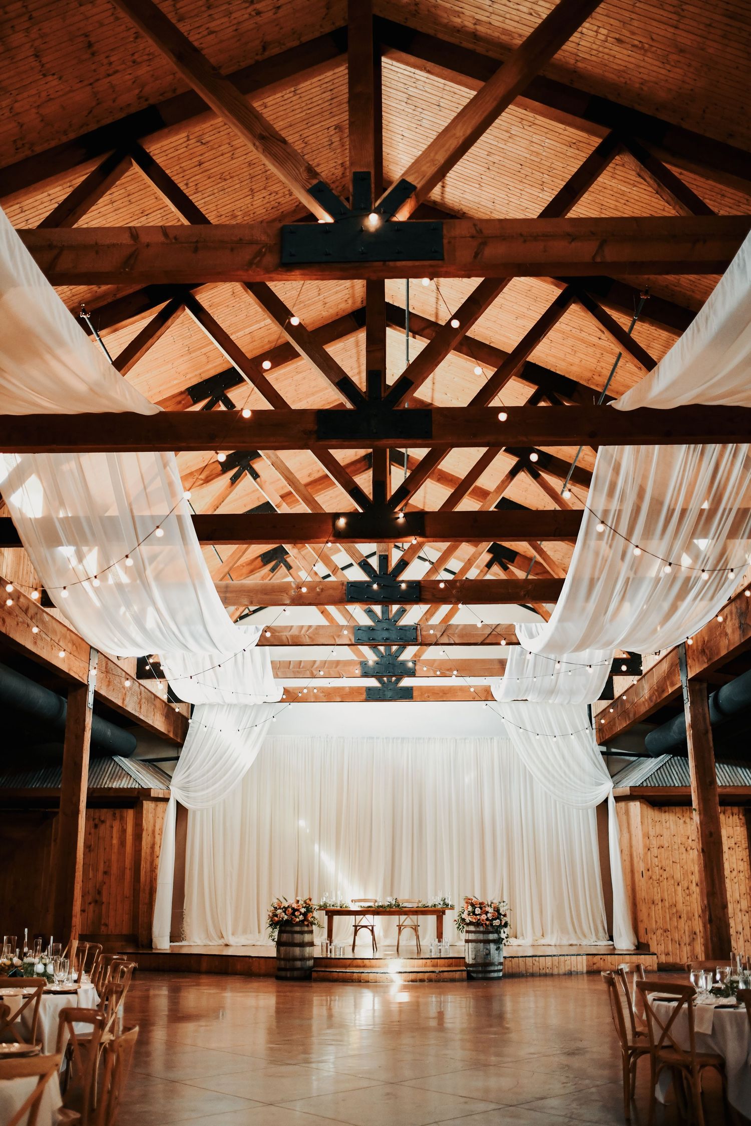 Rustic fall wedding reception decor with gold accents at Lucky Spur Ranch