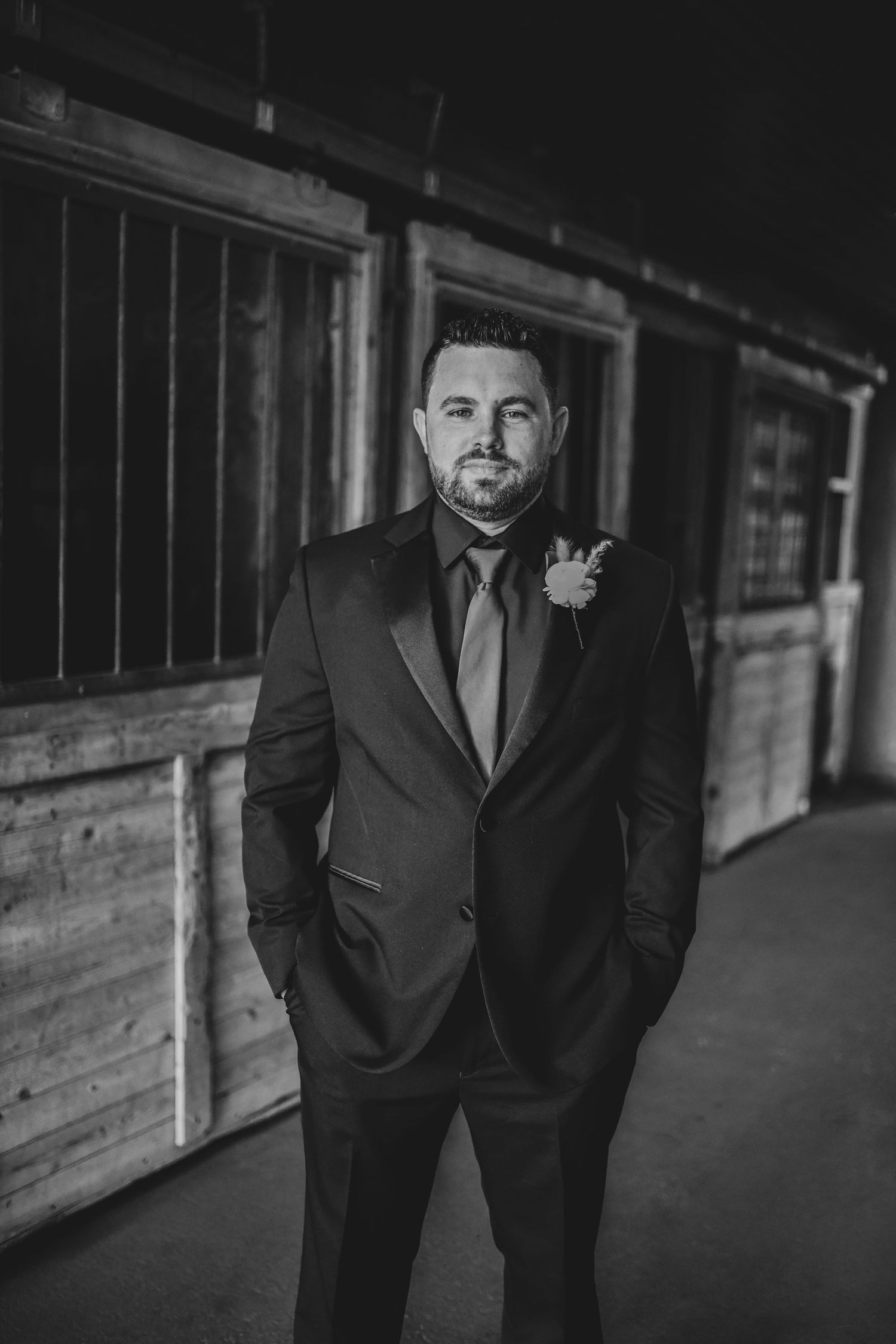 Rustic groom portrait photographed at a North Texas ranch