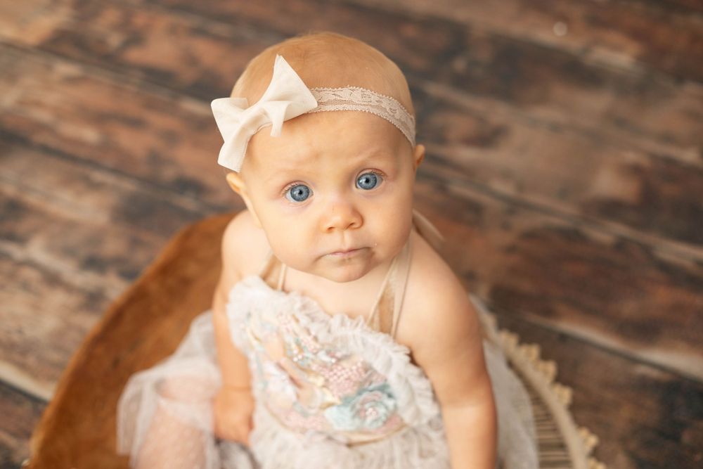 Baby milestone portrait photographed in Central Louisiana studio.