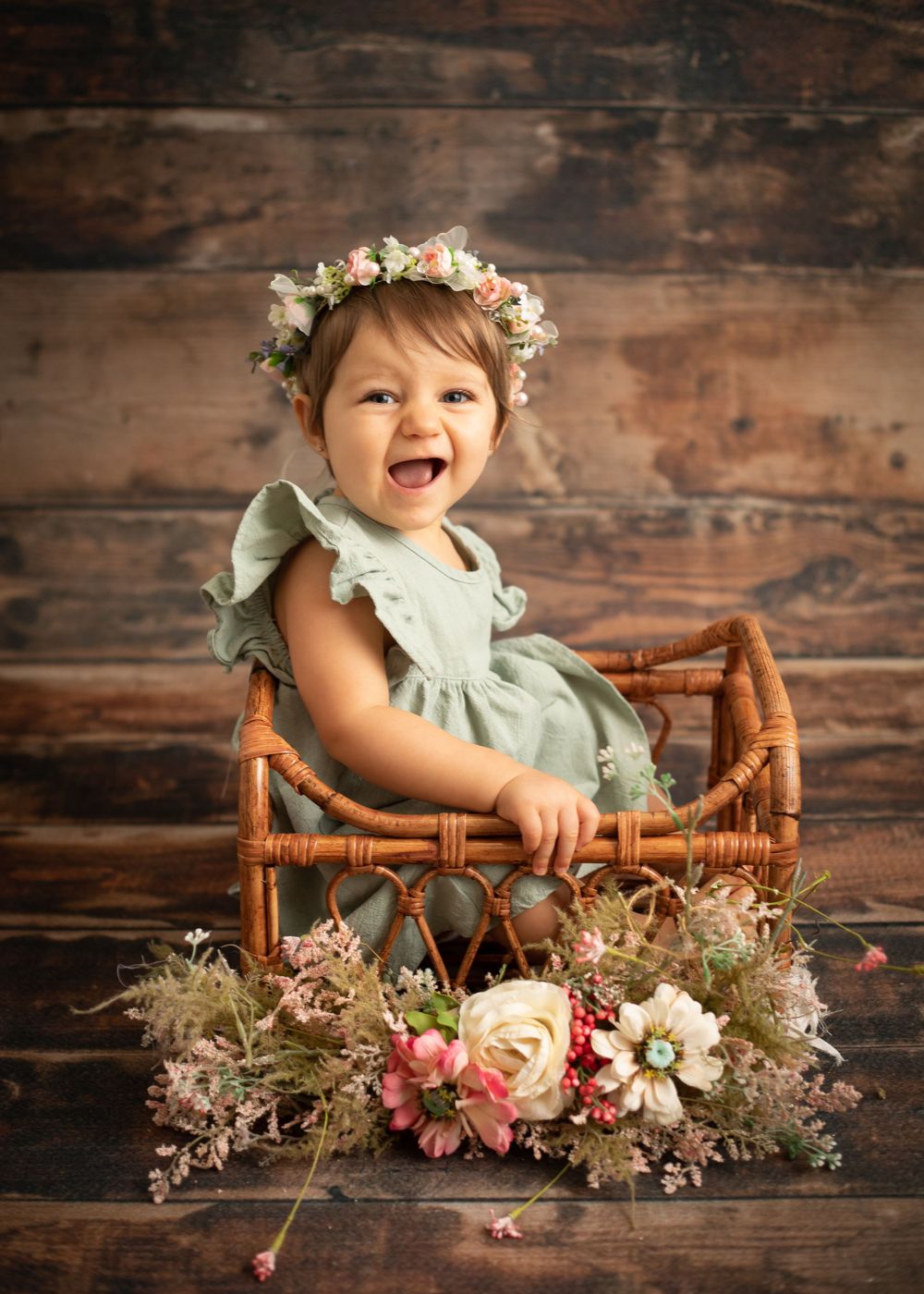 Smiling baby photographed during a milestone session in Central Louisiana.