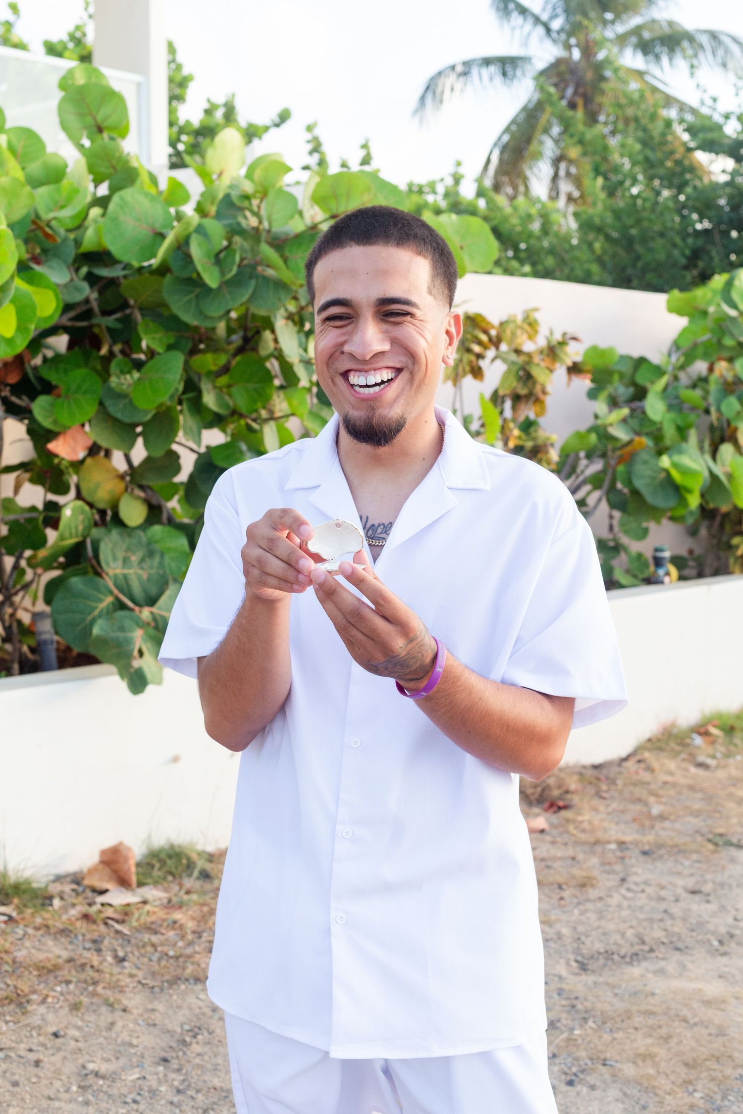 Marriage proposal. Man showing the ring and waiting for the woman to arrive. Río Grande, Puerto Rico.