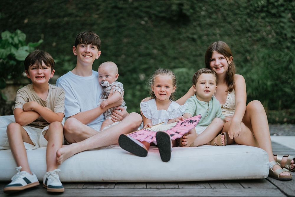 Family photography at Kalapa Bali beachfront resort.