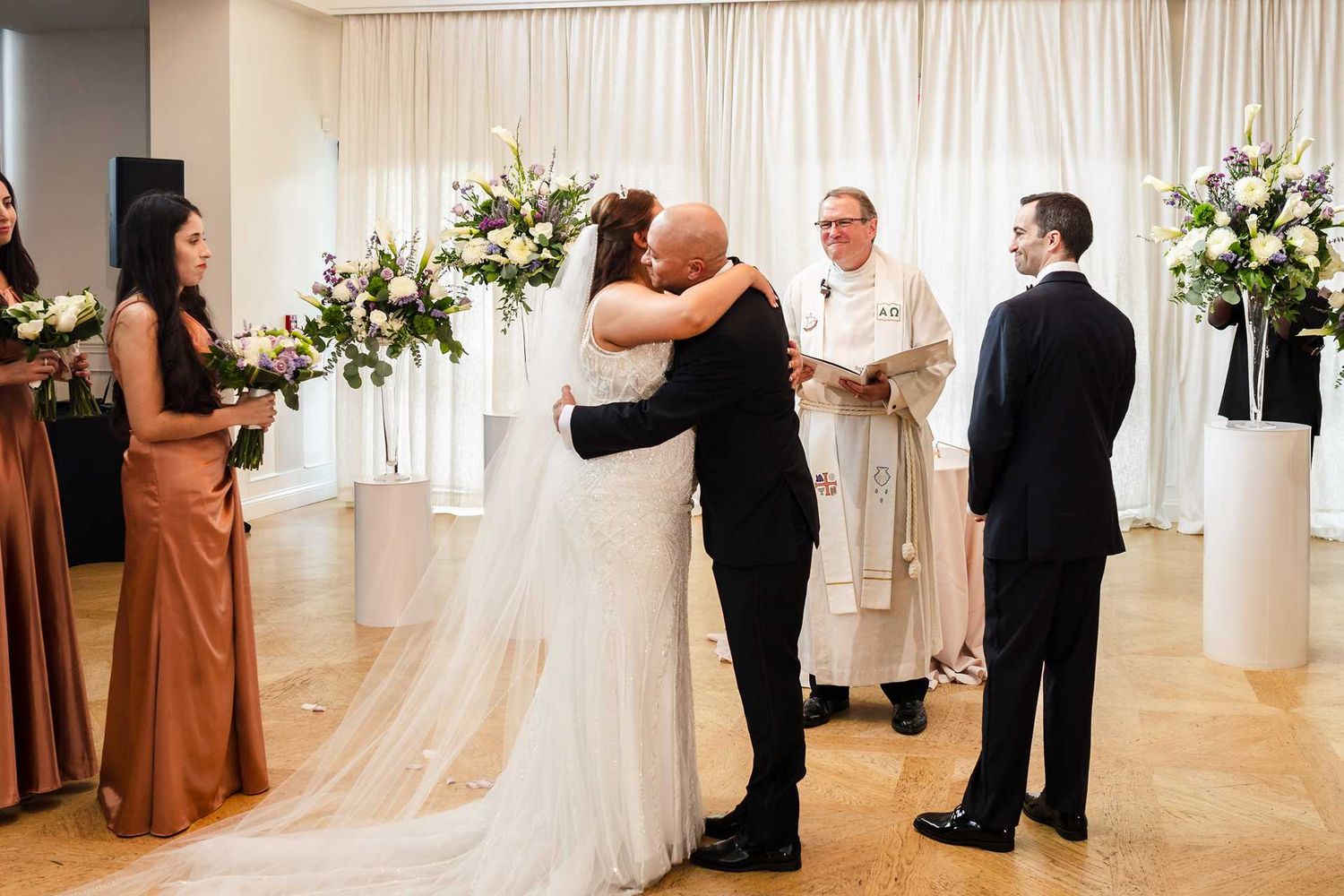 Bride and dad at ceremony in the view venue