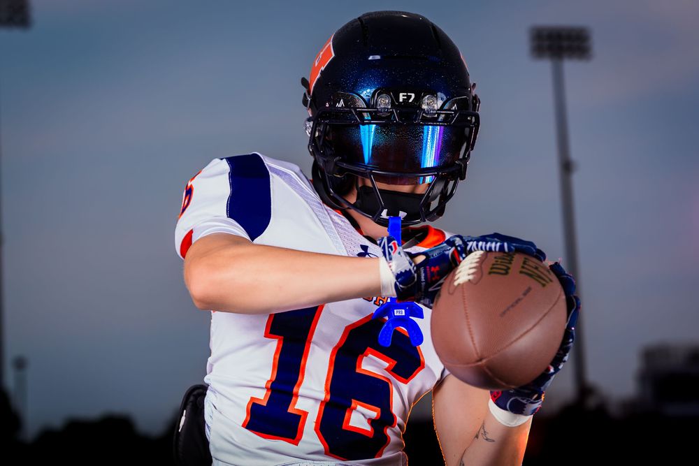 Hershey Trojans football player, #16, catching a football, Media Day, by Deanna Fox, SportsFox Photography based in Hershey PA