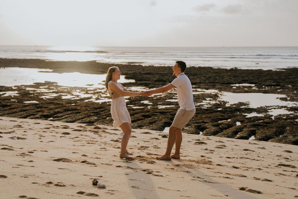 Romantic marriage proposal at Impossible Beach