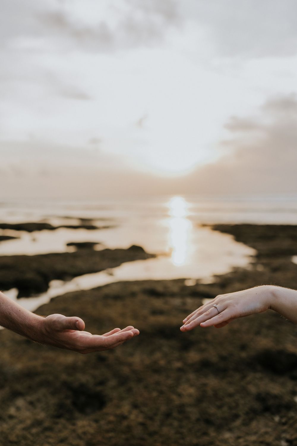 Romantic marriage proposal at Impossible Beach