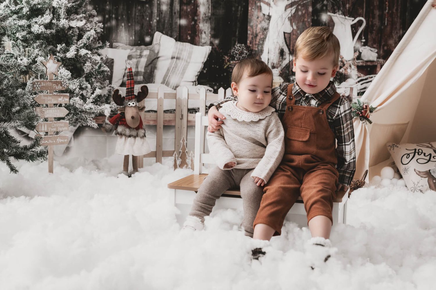 fotografi di famiglia a bruino, vicino torino. Percorso fotografico natalizio 2025 per i tuoi bimbi. Sessioni foto natalizie a Torino.