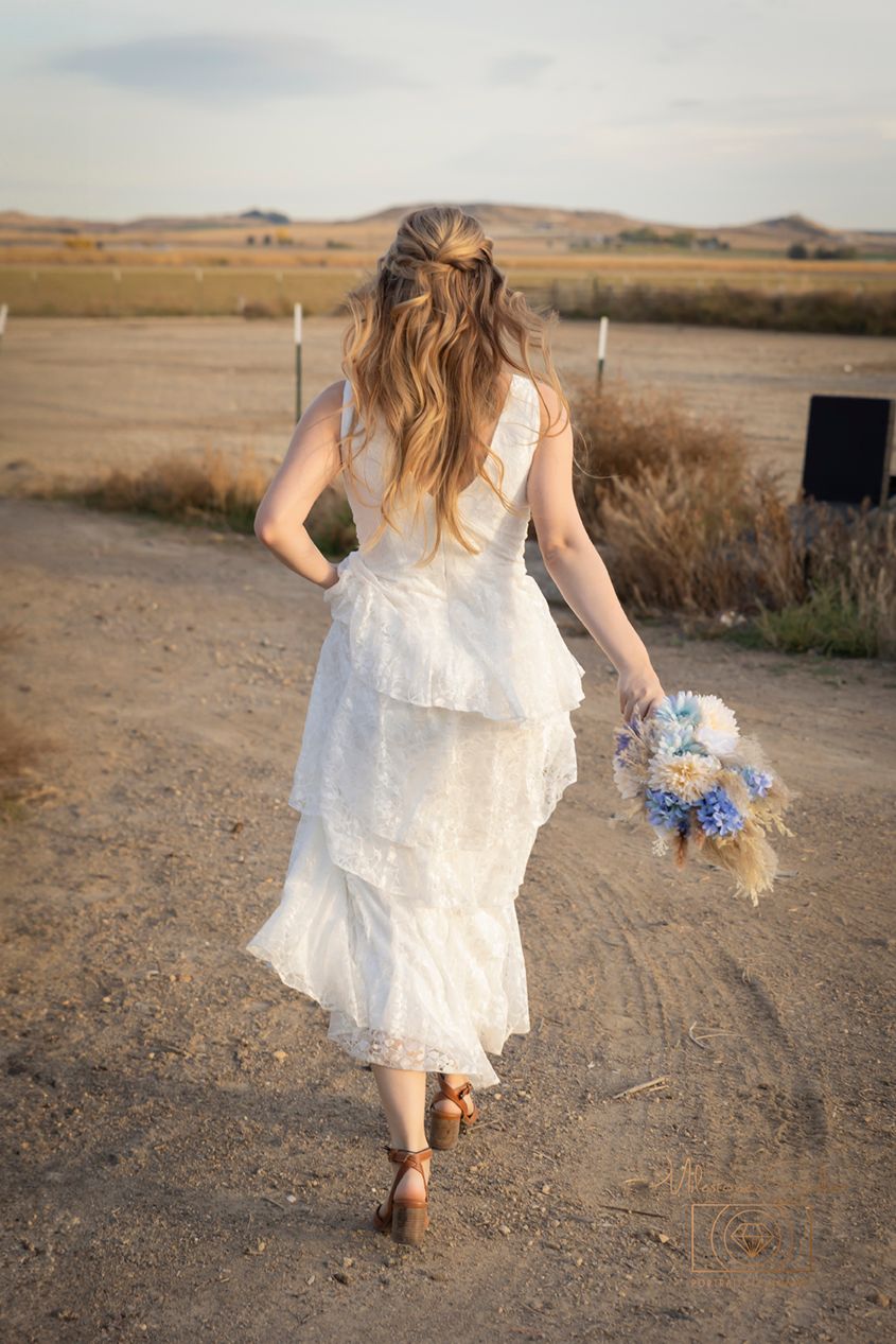 Farmhouse elopement Marsing Idaho Milestones Studios LLC, Lucky Four Farm bride running
