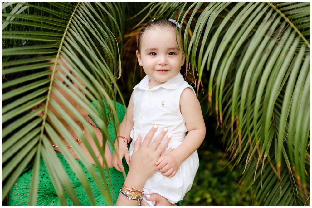 Baby portrait in Punta Mita, Mexico surrounded by tropical palms, natural light family photography Riviera Nayarit.