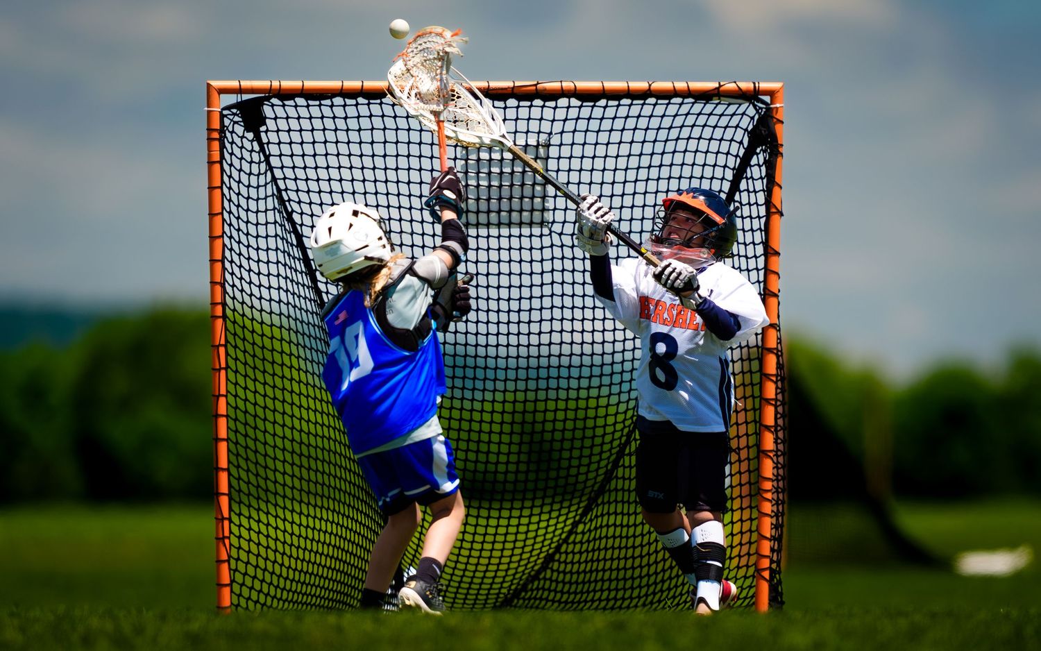 Youth lacrosse goalie defending the net at the Mid Penn Youth Lacrosse Tournament, by Deanna Fox, SportsFox Photography based in Hershey PA