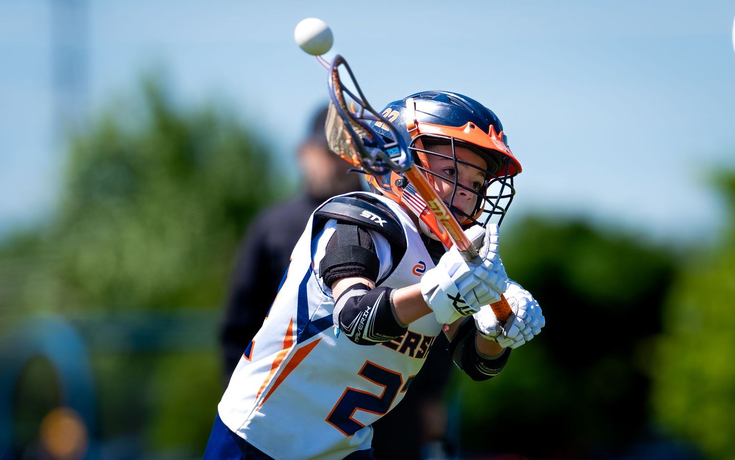 Hershey youth lacrosse player reaching for a high ball at the Mid Penn Tournament, by Deanna Fox, SportsFox Photography based in Hershey PA