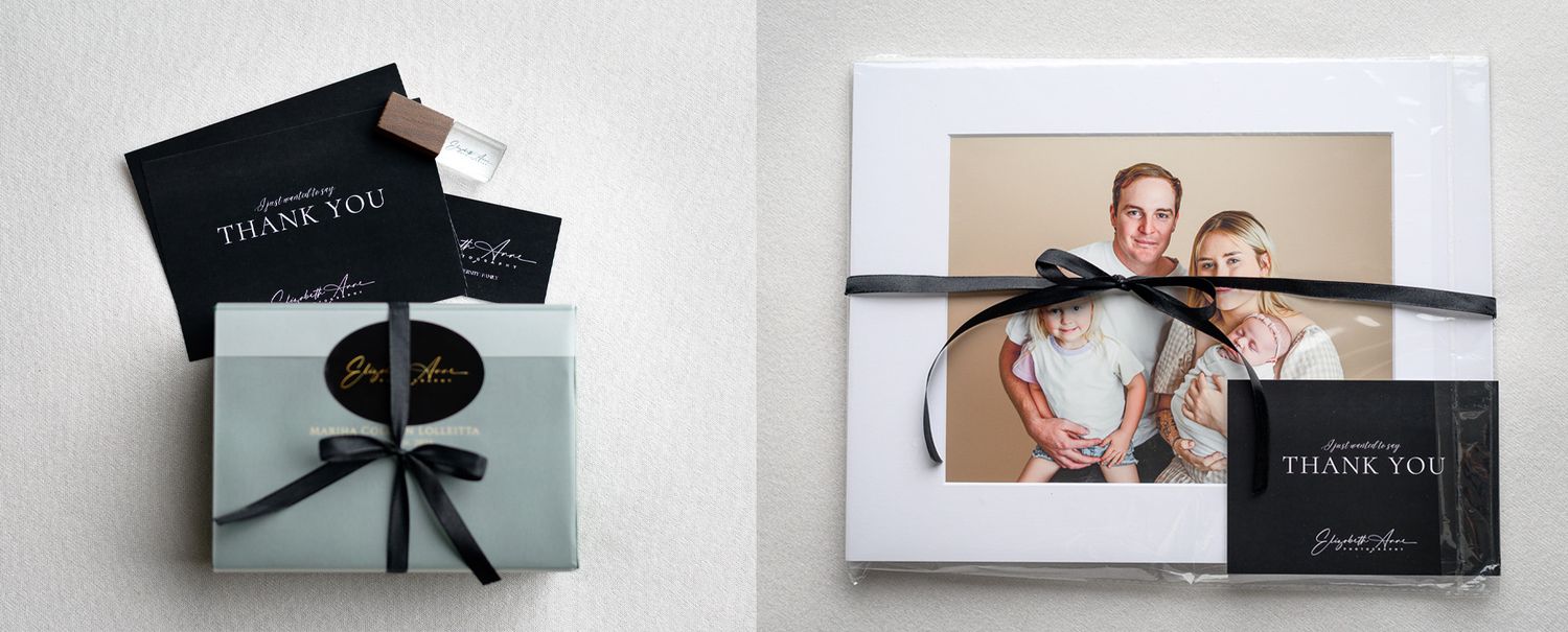 Elegant gift box with black ribbon bow, thank you card, and branded packaging on white background.