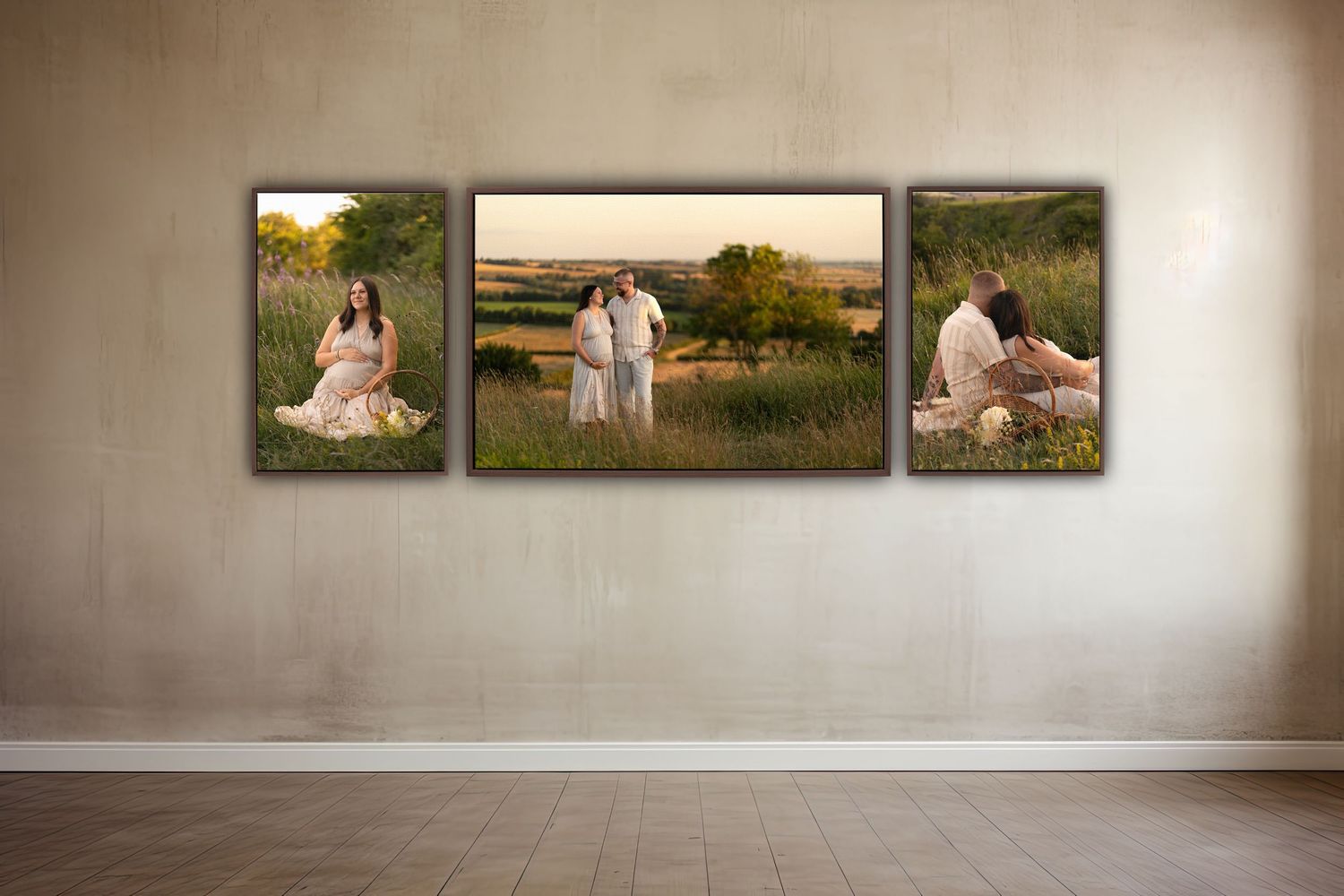 Three canvas prints of a maternity photo session displayed on a wall, featuring a pregnant woman in a field at golden hour.