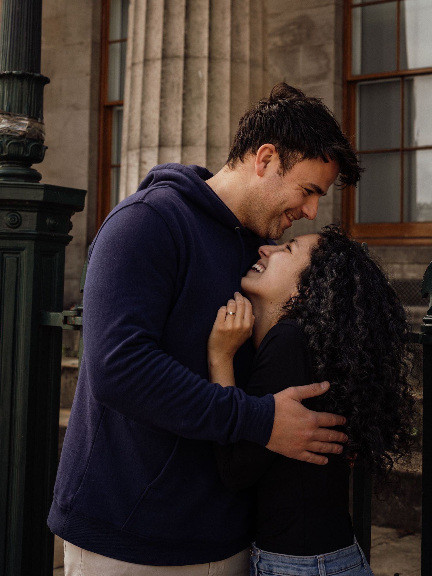 Couple sharing a romantic moment during an Edinburgh couples photoshoot in Scotland.