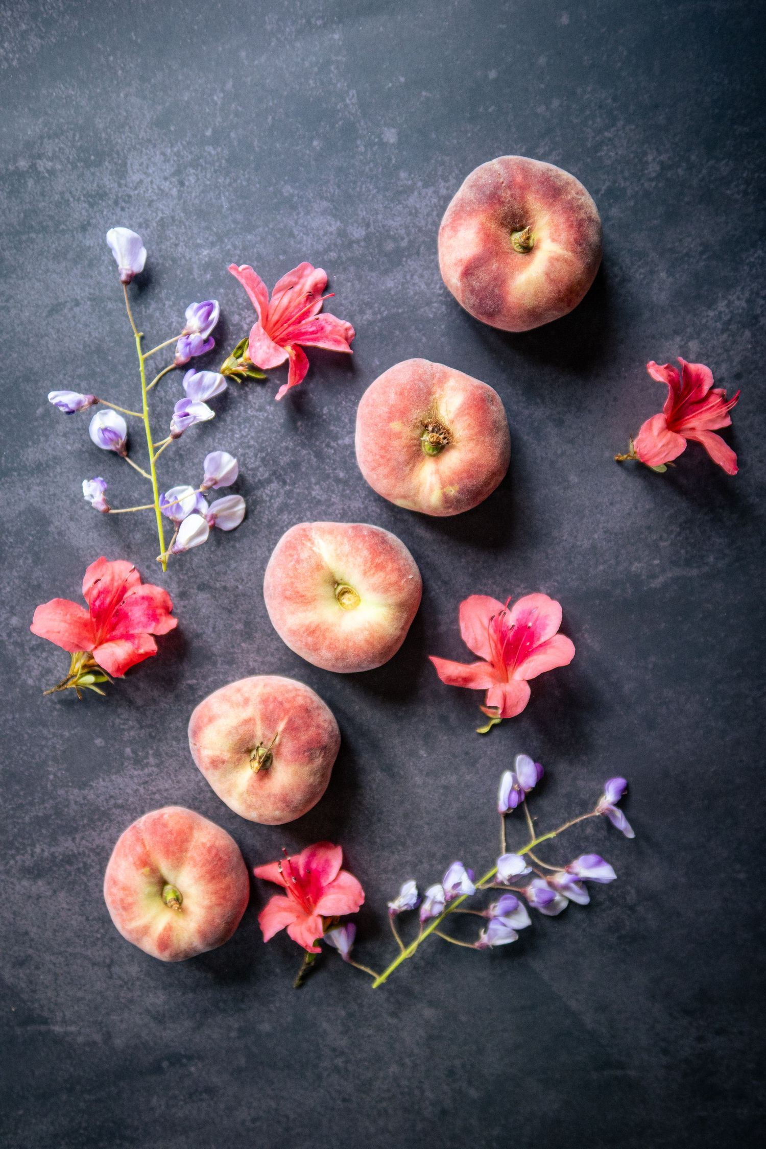 flat peaches and flowers in summer