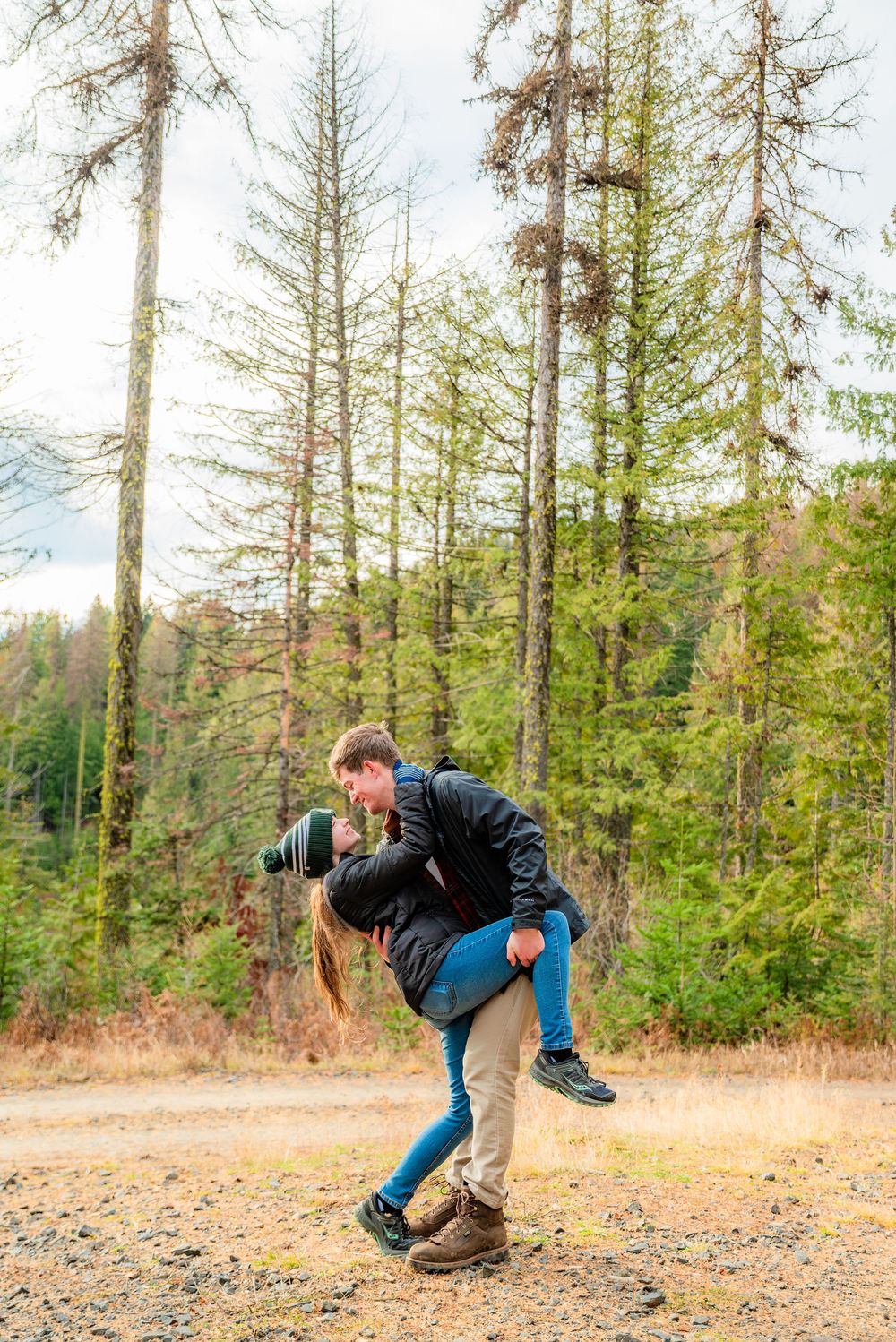 A sequence of photos showing someone falling down on a gravel path in a forest setting.