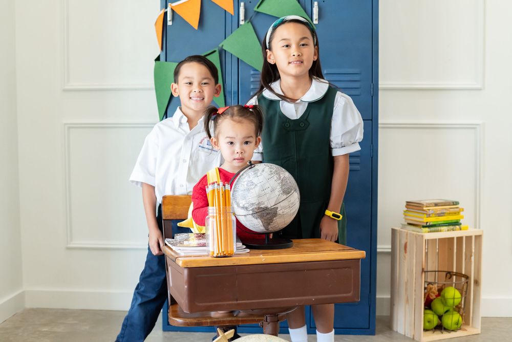 School photo progression showing different angles and poses against blue lockers.