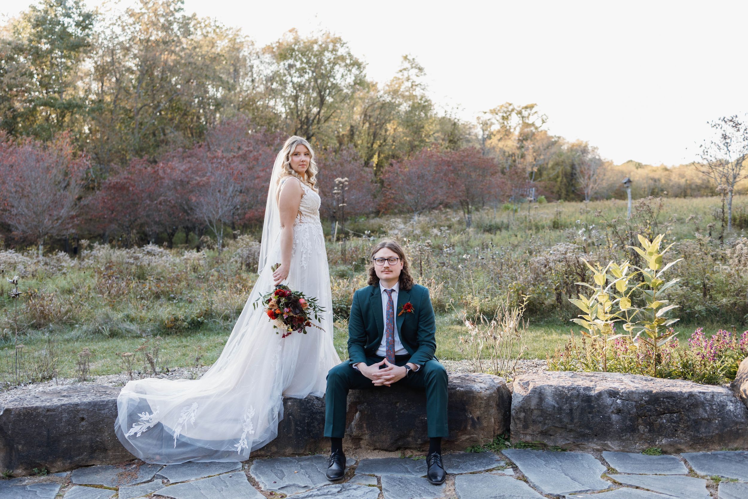 Newlyweds surrounded by greenery at Pittsburgh Botanic Gardens