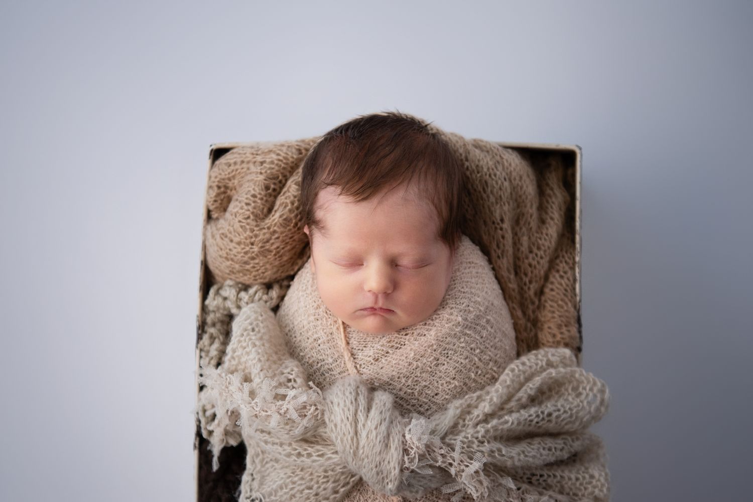 Newborn boy, beige and brown tones, bean bag, studio in Kempsey. Port Macquarie, Coffs Harbour, Mid North Coast.