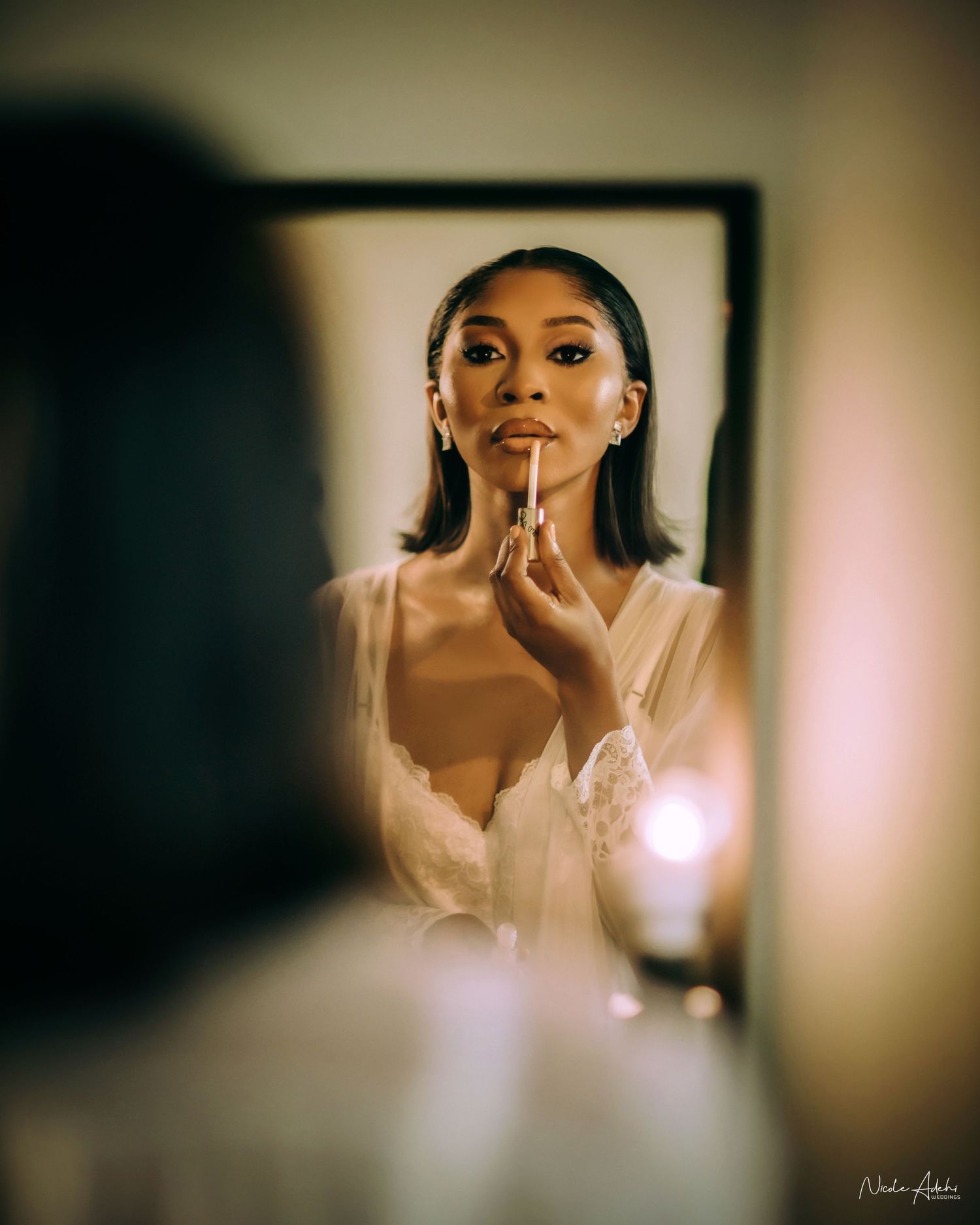 bride looking at her self in the mirror Destination wedding photography by Nicole Adehi, VALEO Photography worldwide