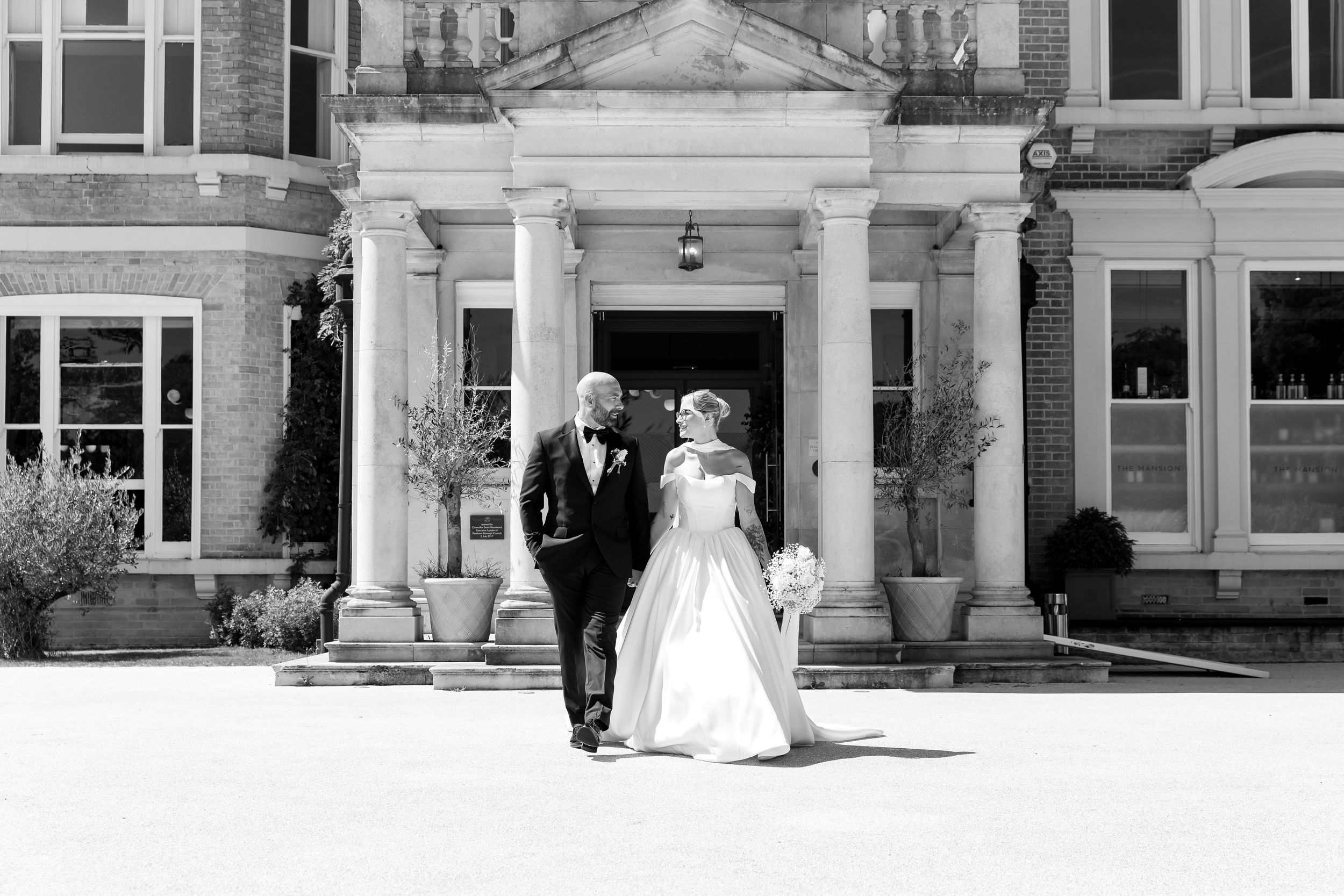 Bride & Groom walking outside Orange Grove Hotel & Gardens, Coldeast, Southampton