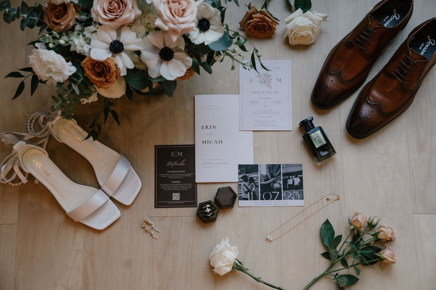 Writing materials scattered on a desk with sunlight casting shadows, featuring papers, a perfume bottle, and dried flowers. Details flat lay