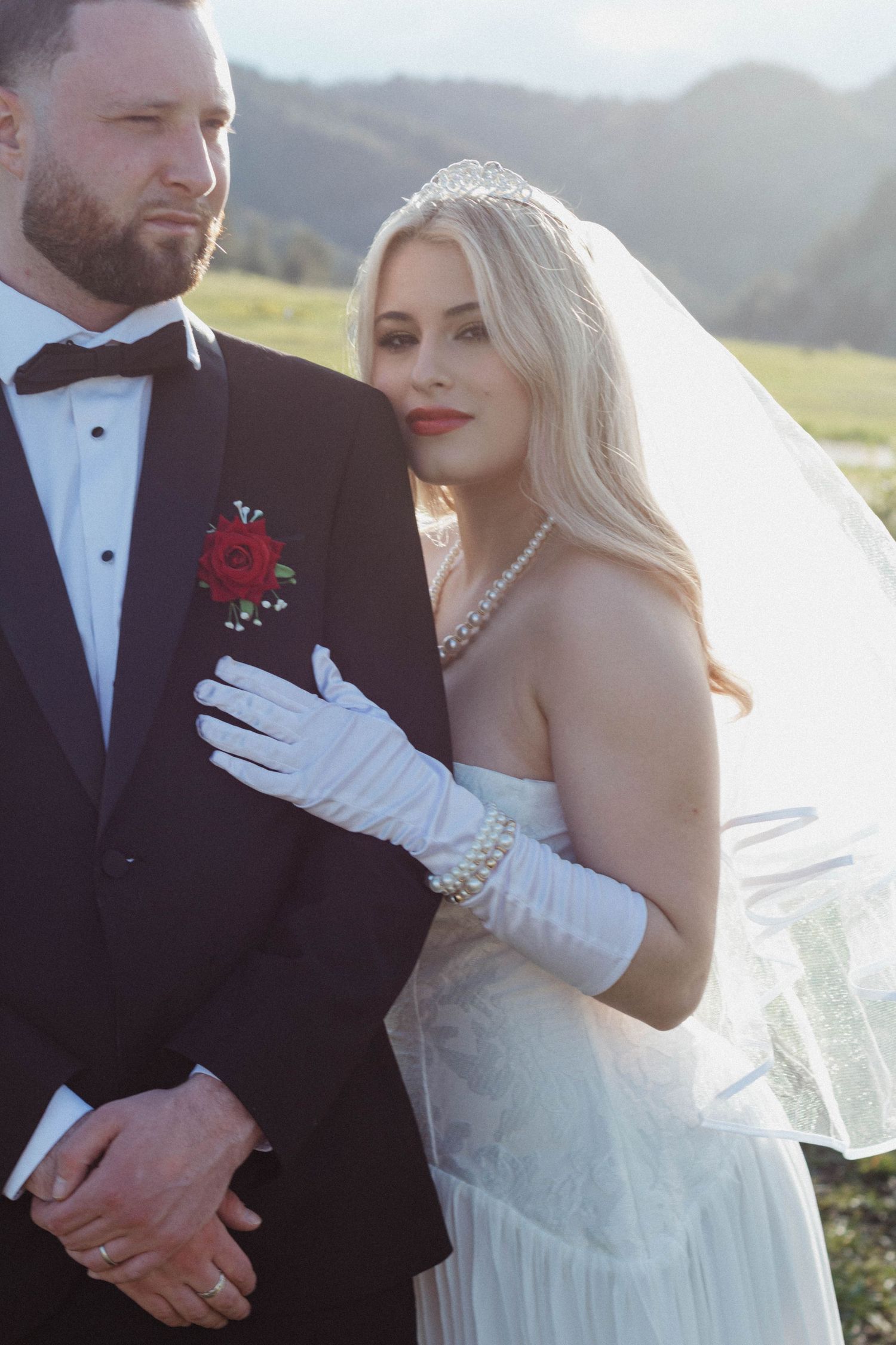 A romantic wedding photo series showing close-up details of a couple in formal attire with white gloves and a flowing veil.