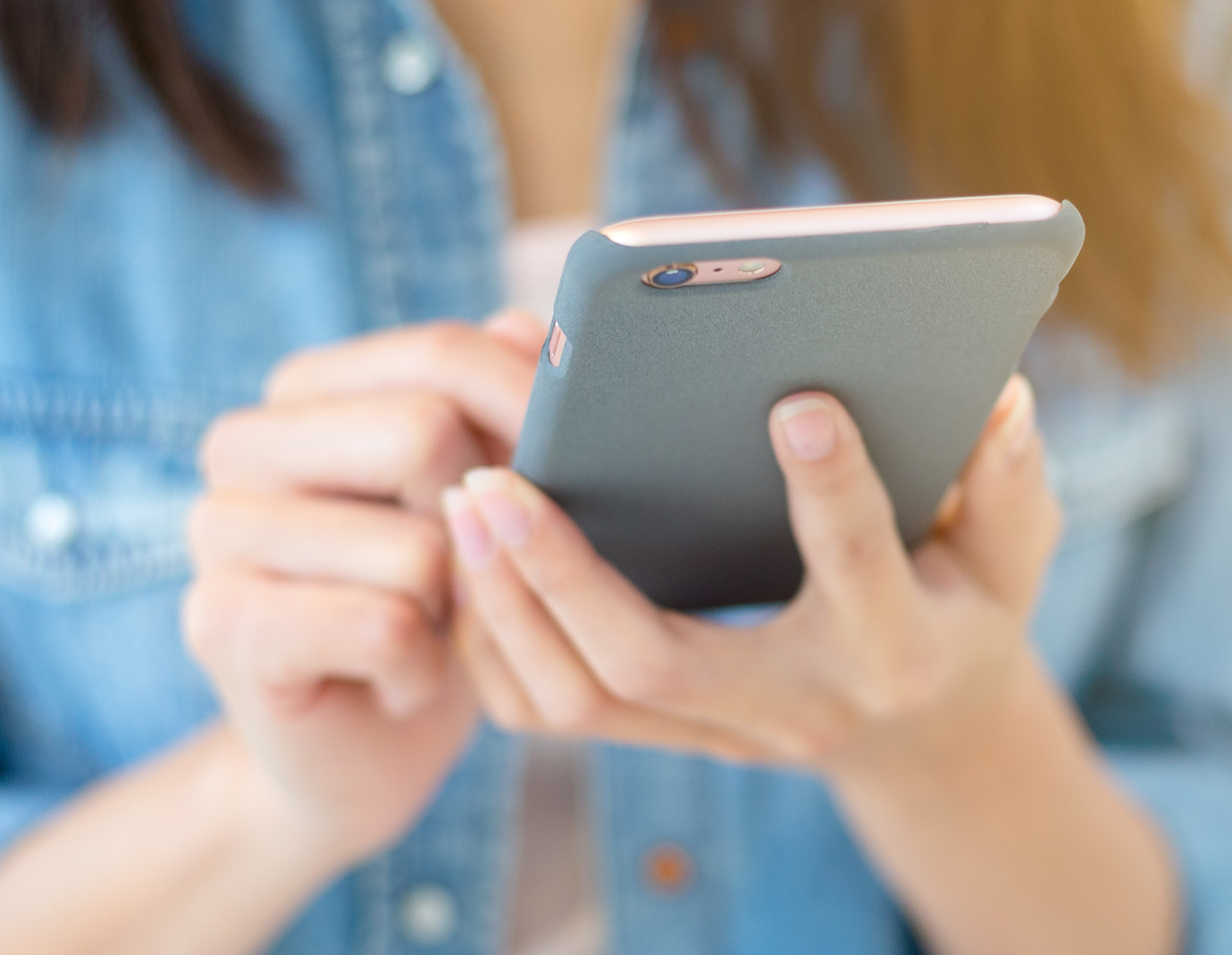 Women holding phone