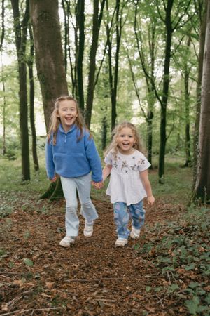 Creative family photos with natural light in Northern Ireland forest.