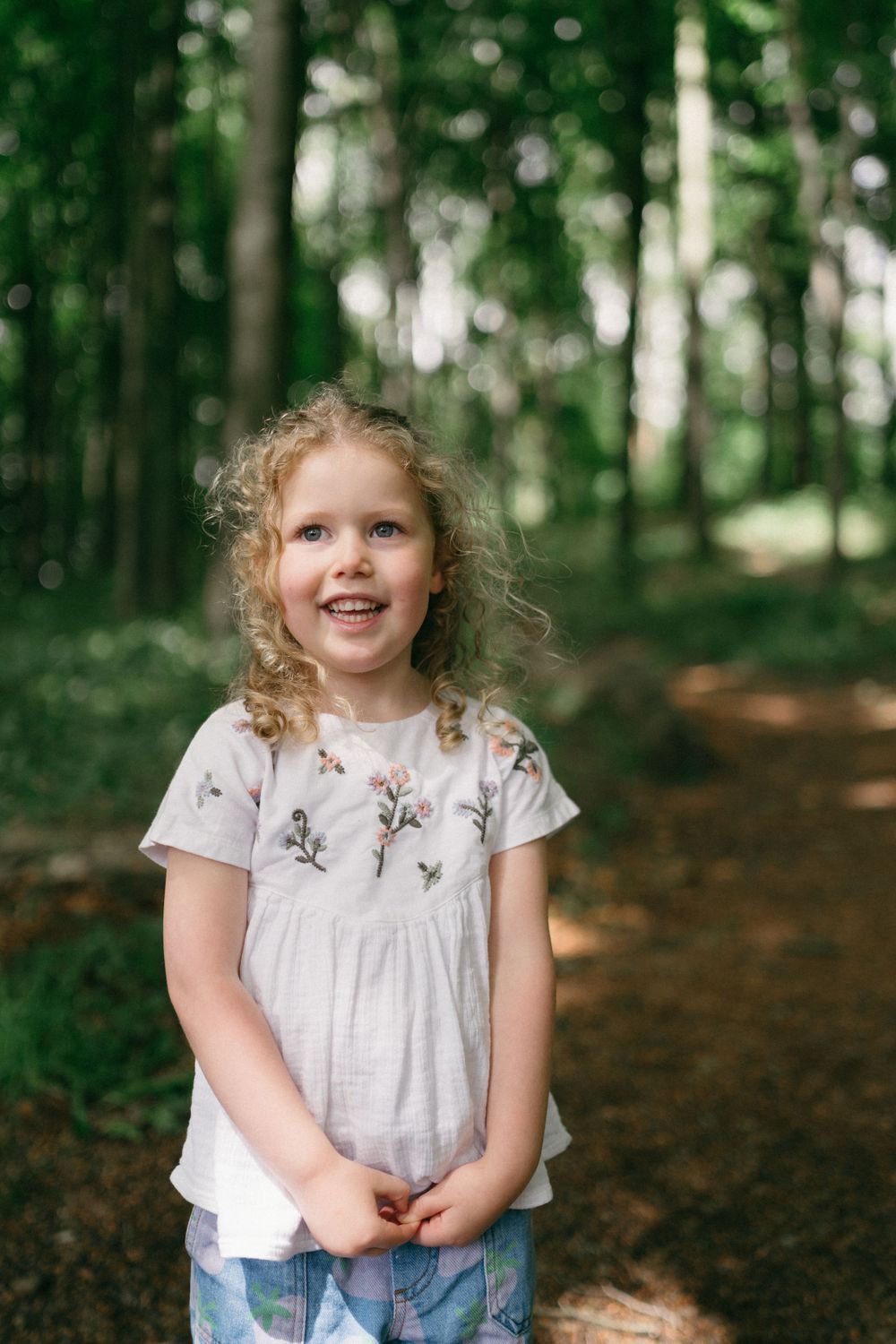 Fine art family photos with natural light in Northern Ireland forest.
