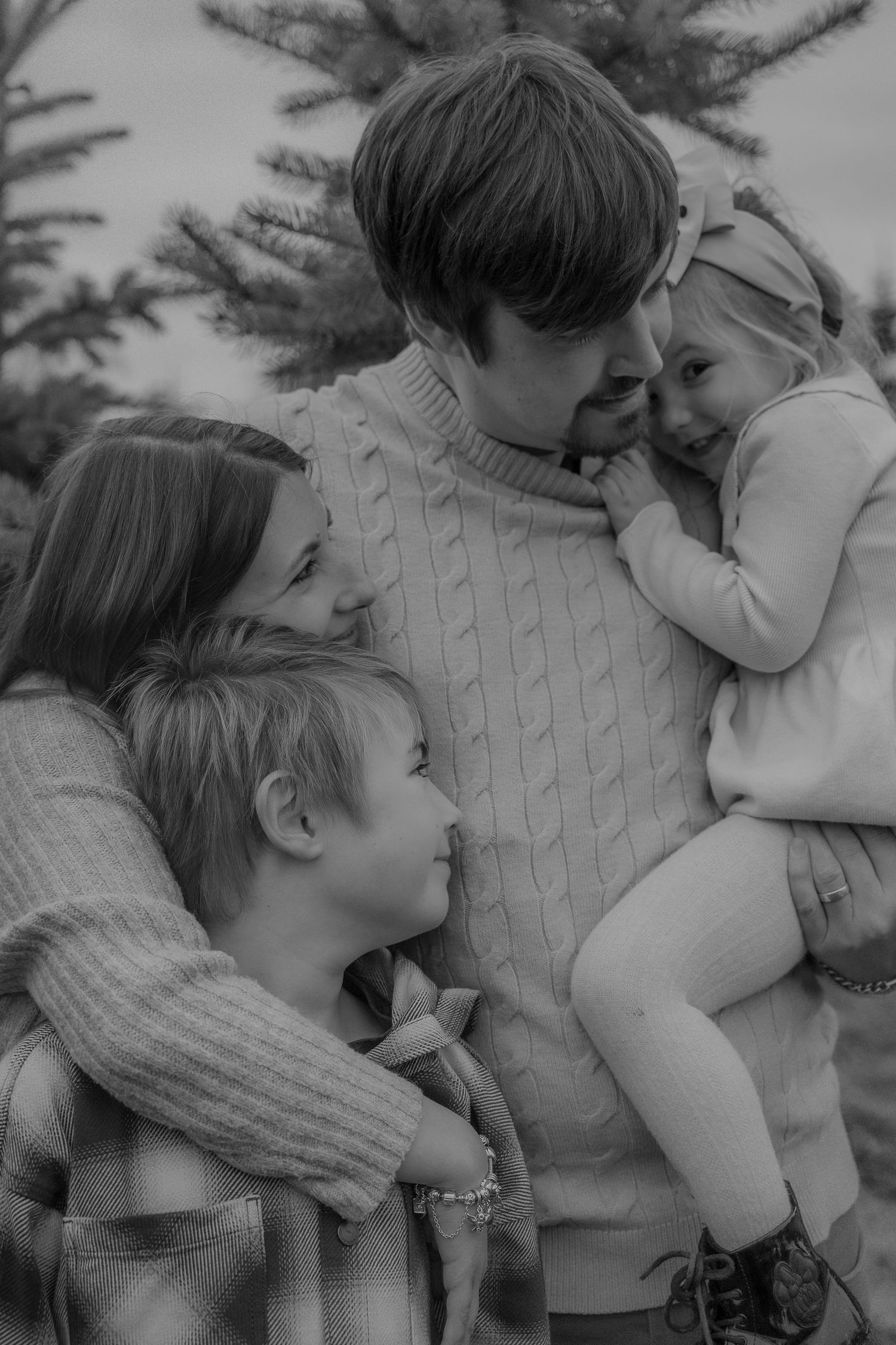 Natural family photography capturing playful movement and closeness