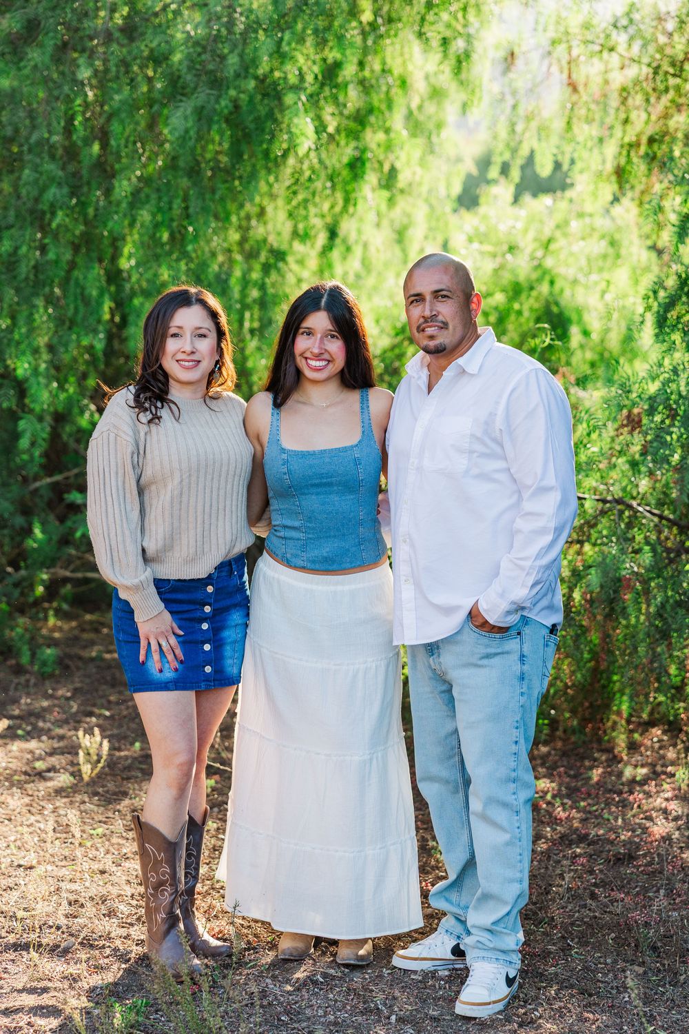 Family group photos taken against a backdrop of green trees and natural scenery.