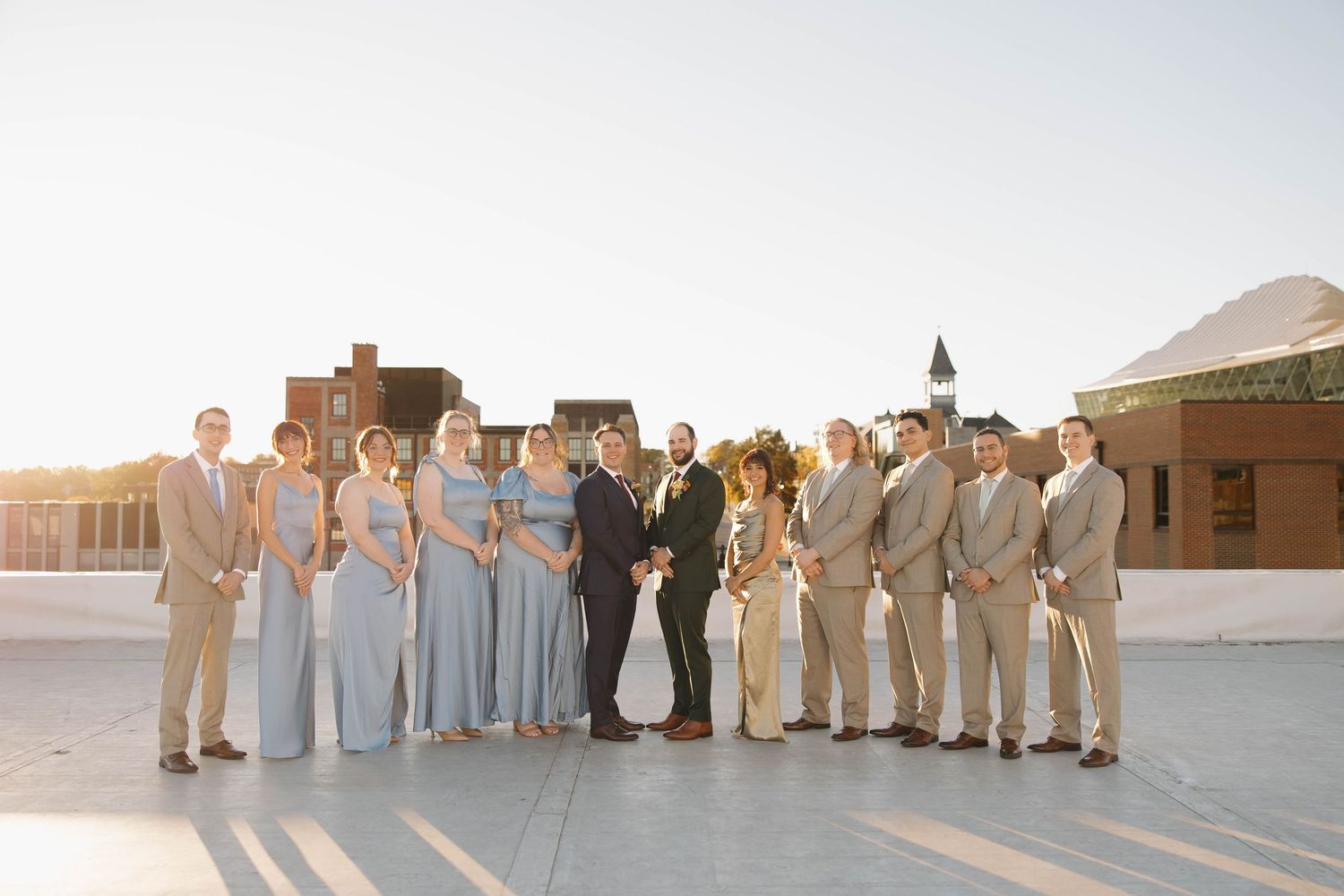 A series of wedding party photos arranged in a horizontal strip showing outdoor scenes in light blue and beige tones.