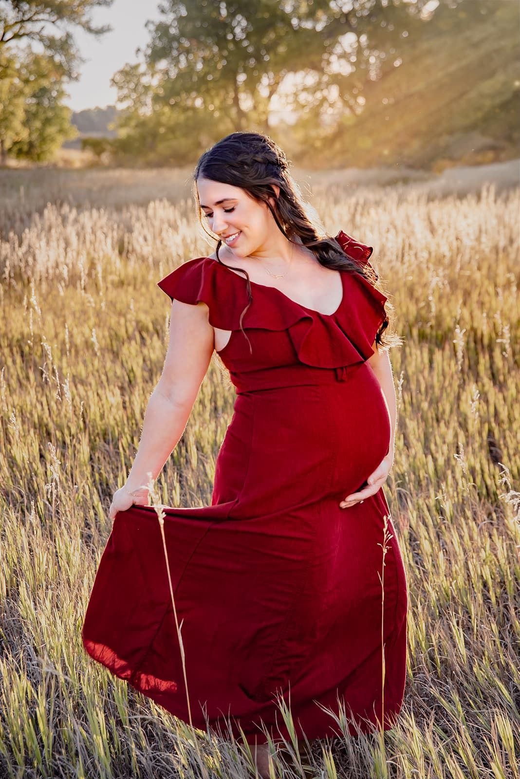 Denver maternity photography of a family session at sunset at Van Bibber Park in Arvada, Colorado.