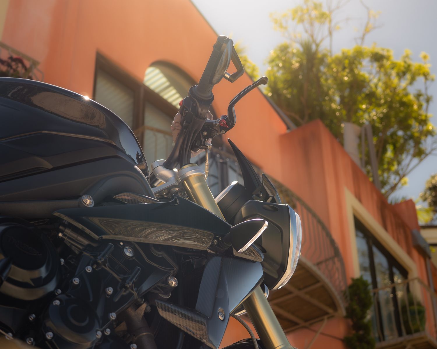 Upward angle of a black Street Triple 675 motorcycle