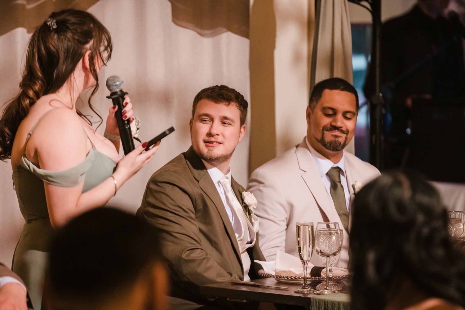 Grooms smiling during heartfelt wedding speech at Briar Barn Inn reception